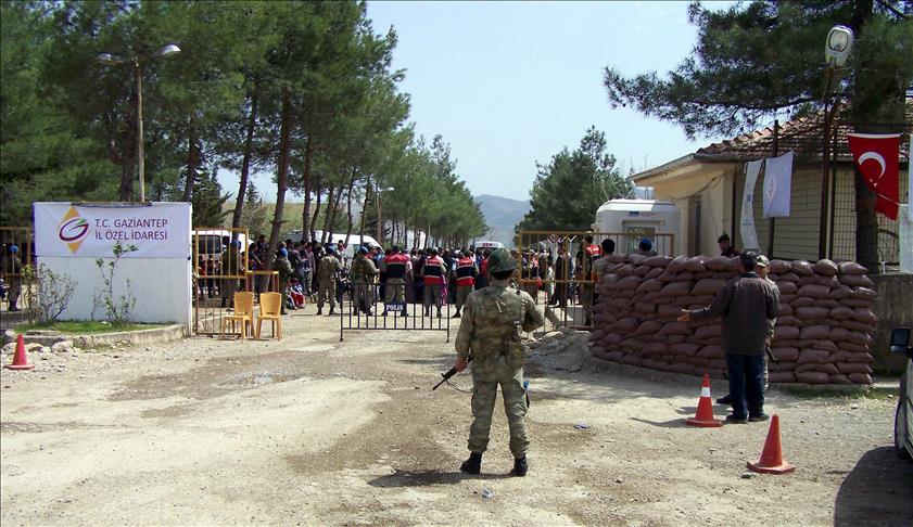 Turkey warns Syria to end clashes in border region
