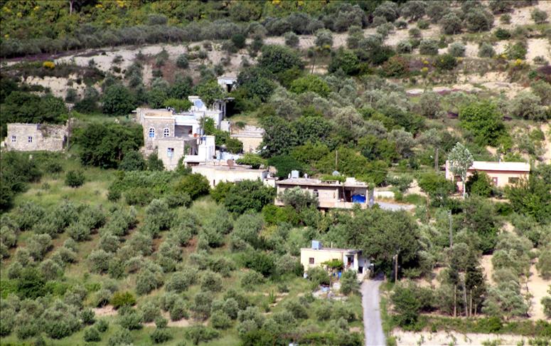 Turkish villagers hear sounds of clashes in Latakia and Idlib