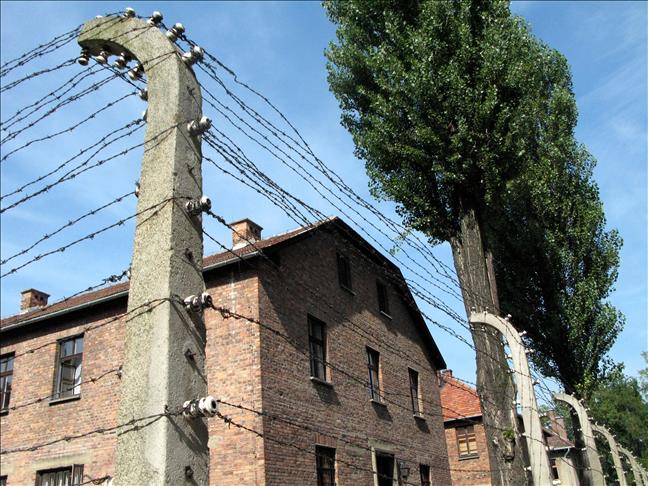 Muslim religious leaders perform prayer in Nazi camp