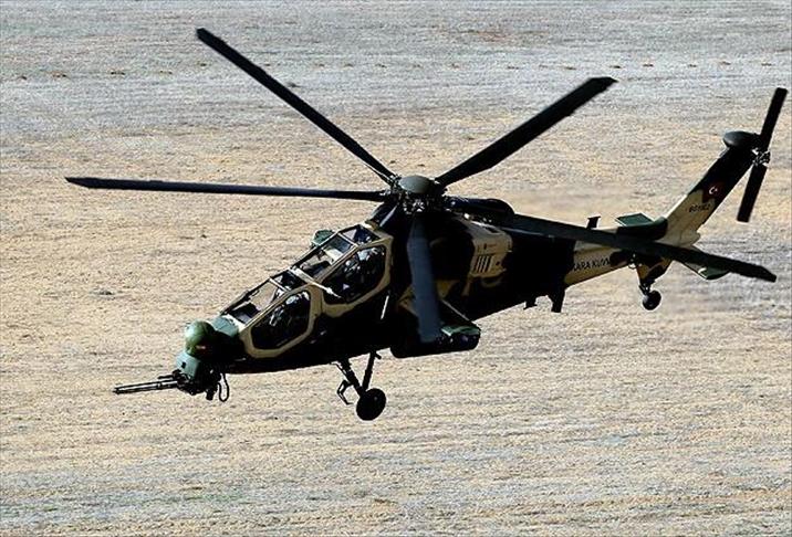 Abandoned helicopter waits for pilot in Turkish field