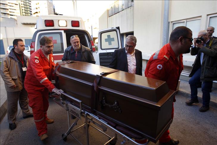 British doctor's body arrives in UK