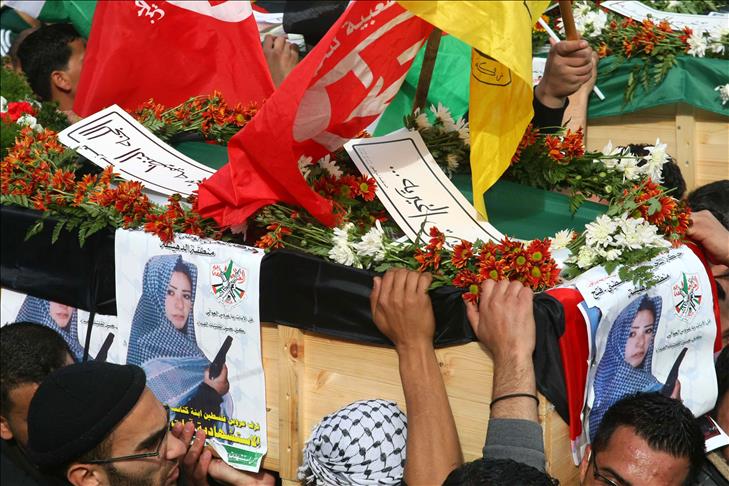 Palestinians bury remains of 2 deceased relatives returned by Israel