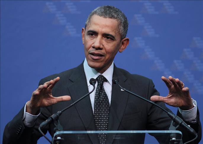 Obama signs act to deny visa to Iran envoy