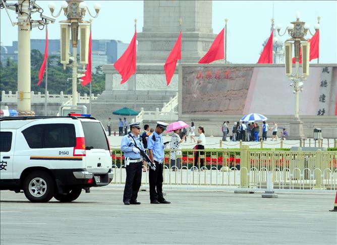 Soldiers patrol China's Tiananmen on anniversary of deaths