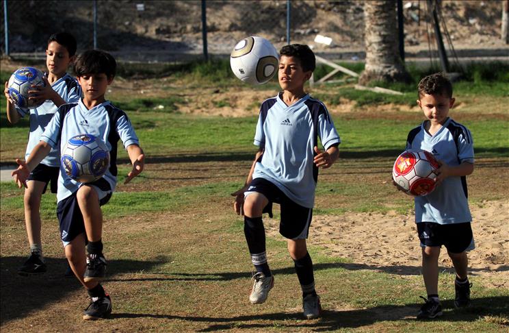 Football solaces grieving children in bombed Gaza