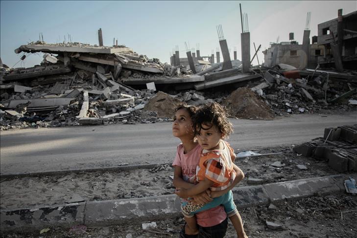 Israeli strike kills 13; Gaza death toll hits 2,036