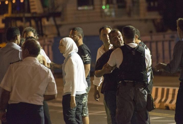 Rescued refugees finally disembark in Greek Cyprus