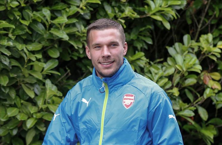 Arsenal forward Poldi rejects club transfer offers