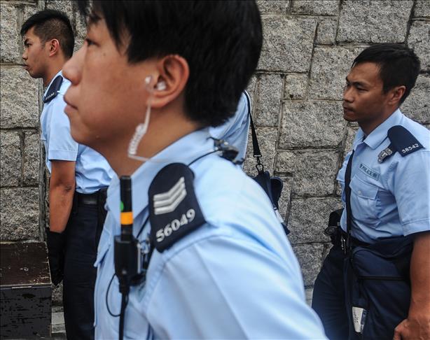 British banker questioned in Hong Kong over women's deaths