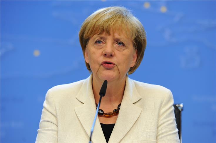 UK snubs Merkel's warnings over immigration curbs