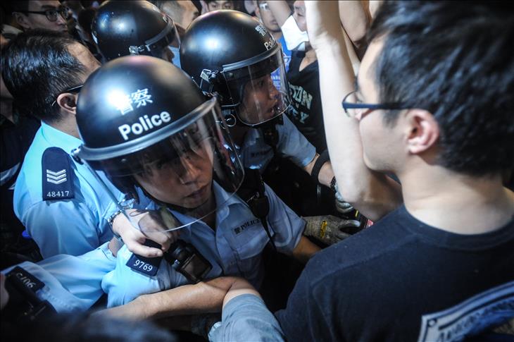 Hong Kong police clear protesters from newly occupied streets