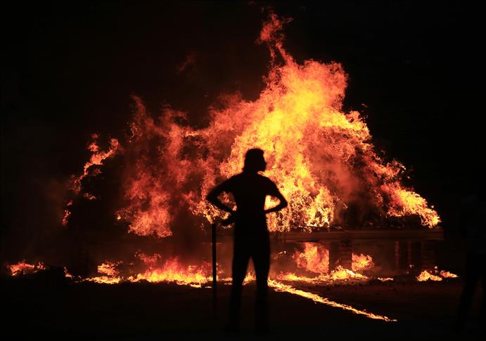 Pakistani fire rages for 13 hours, engulfs timber market