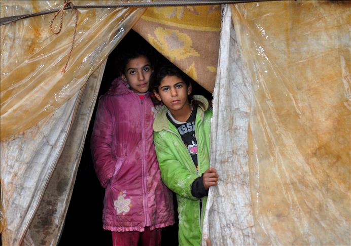 Switzerland urged to take in 100,000 Syrians