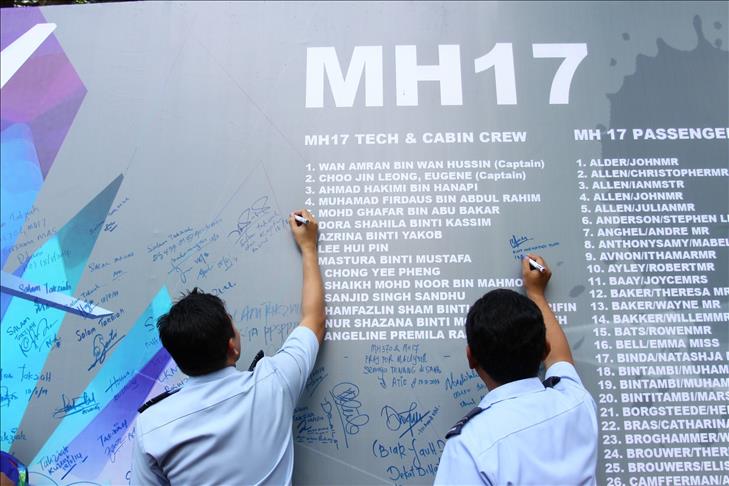 Malaysia declares MH370 an accident as search continues