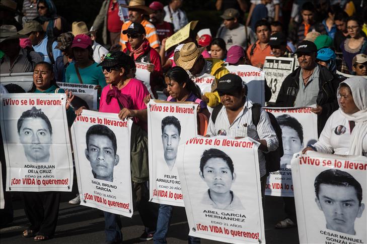 Thousands march 5 months after Mexican students disappeared