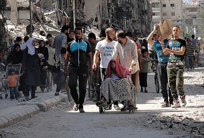 Syrian rights group: At least 13 killed in Yarmouk camp