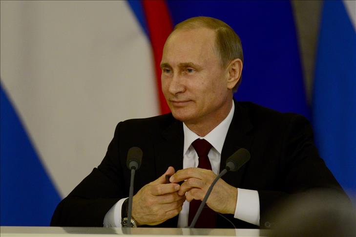 Putin defends Crimea annexation as 'historical justice'