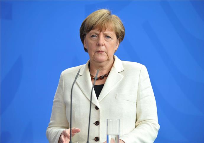 Merkel 'dedicated' to saving Greece