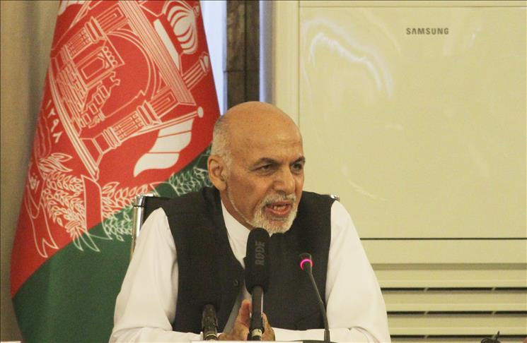 Afghan president vows to improve women's rights