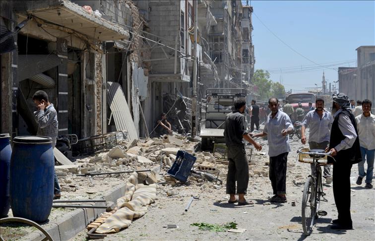 Assad regime barrel bombs kill 20 across Syria