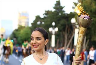 Brazil unveils Olympic torch, marathon route to Rio
