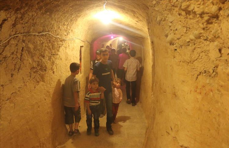 Underground funfair provides relief for Syrian children