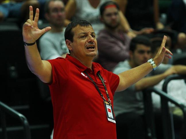 Basketball: Row rages over national coach's dual role