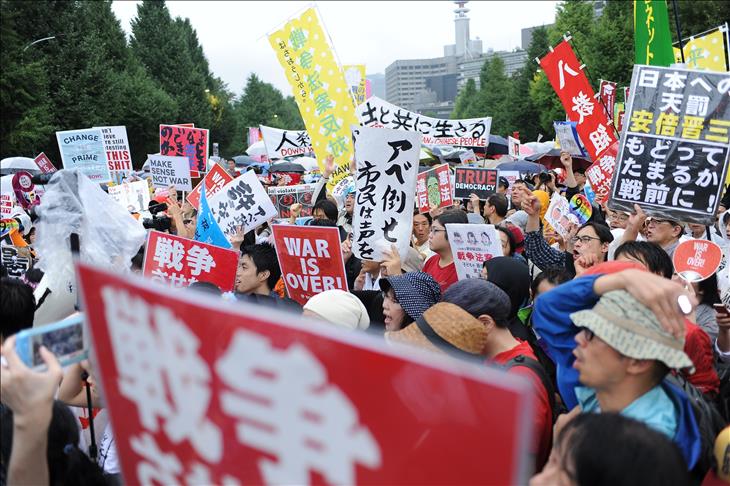 Protestors take on Japanese leader over security bills