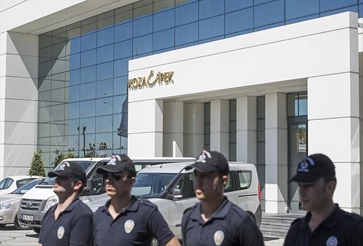 Turkish police search premises of two holdings