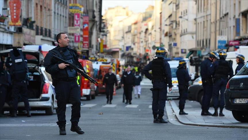  Paris suburb erupts with gunfire, explosions