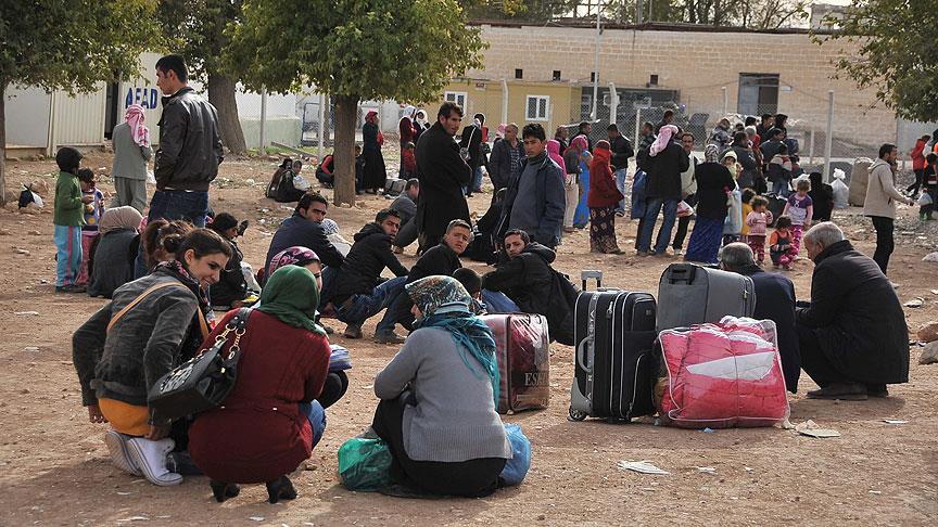 Kobani'ye geçişler sürüyor