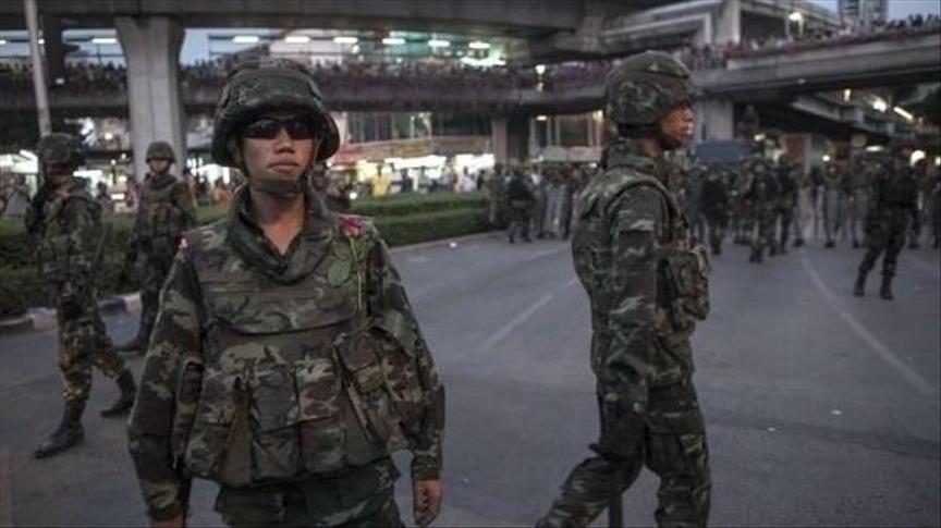 Thai junta opponents held on way to probe military