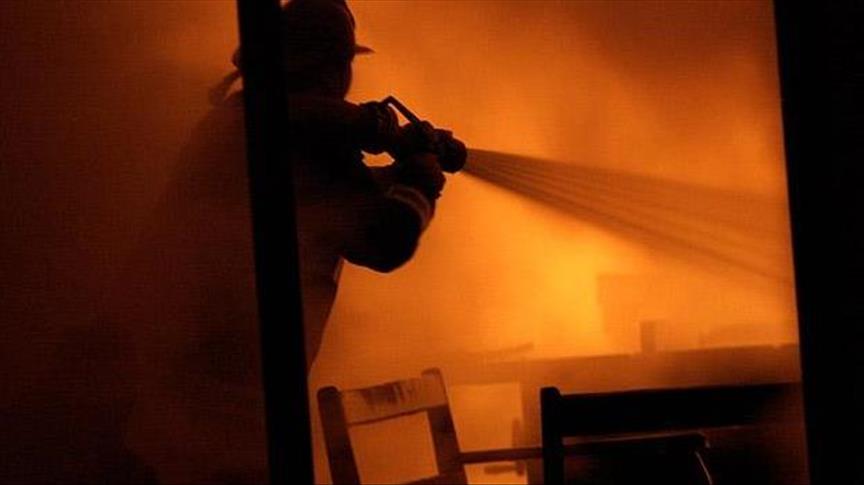 Fire near Philippine capital kills 9, razes 50 homes