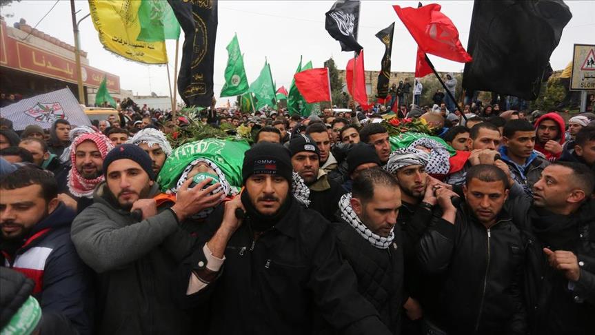 Thousands attend Ramallah funeral for slain Palestinians