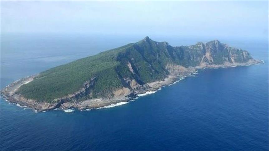 China denies building missile system in South China Sea