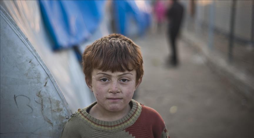 250,000 Syrian children living under siege, report says