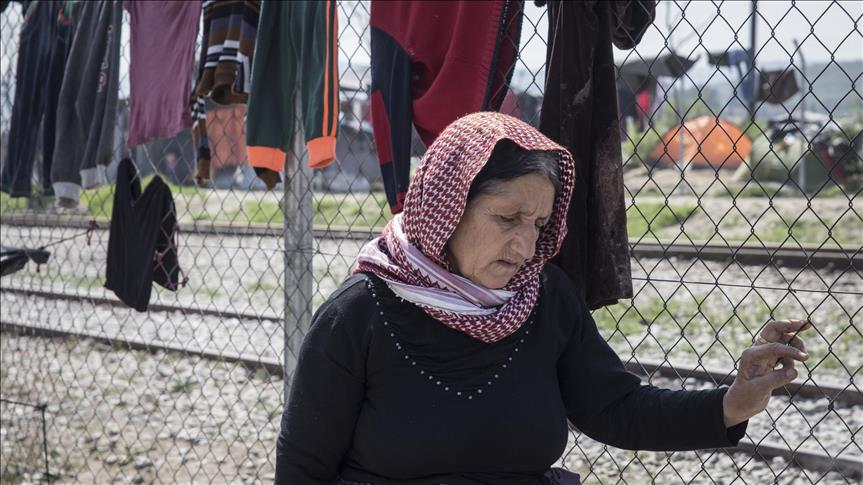 Stranded migrants in Greece selling food and services