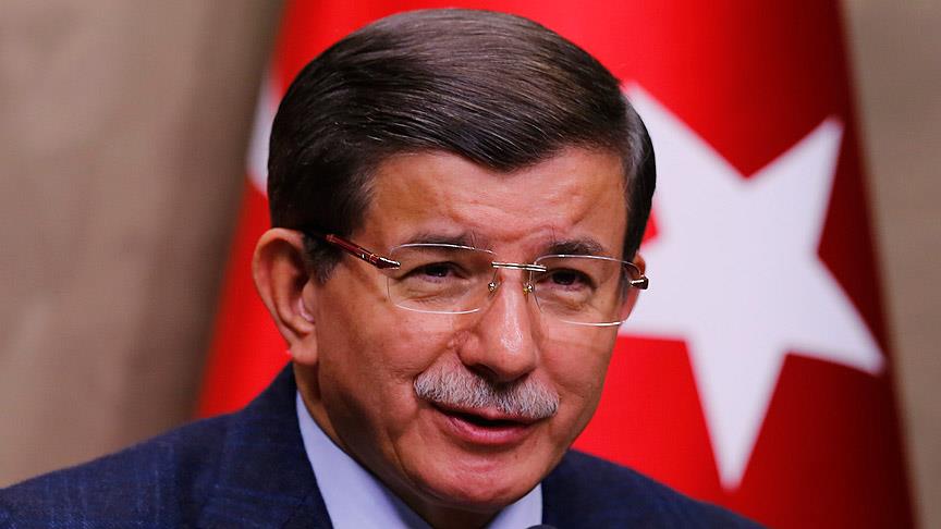 Başbakan Davutoğlu'ndan Başkan Özbek'e tebrik telefonu