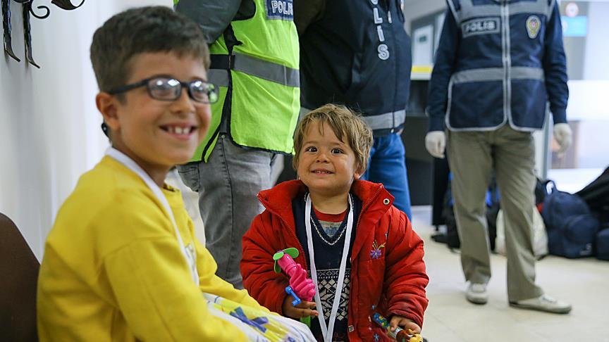 Twelve Syrian refugees flown to Turkey from Greece
