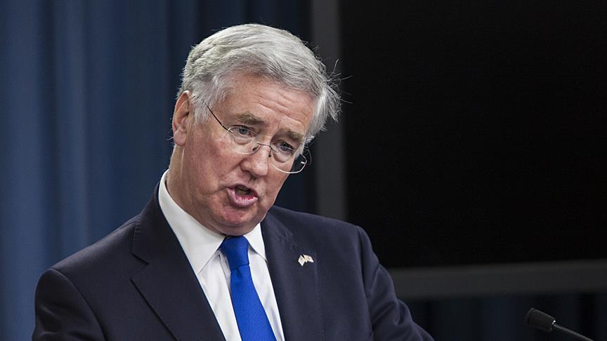 British defense secretary apologises to local preacher