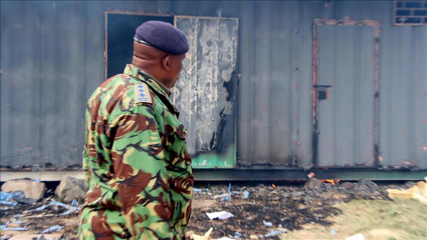 Protestors burn Kenyan police post over slain trio