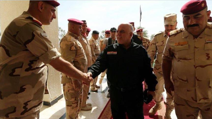 العراق يضم قوات "الحشد الشعبي" رسميا إلى الجيش