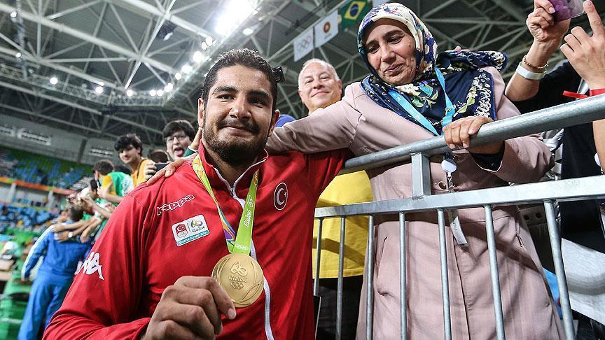 Turkey's Olympic gold winner happy to bring medal home