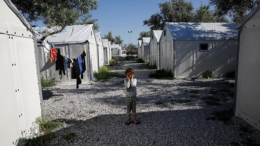 Greek refugee camp evacuated amid fires, clashes