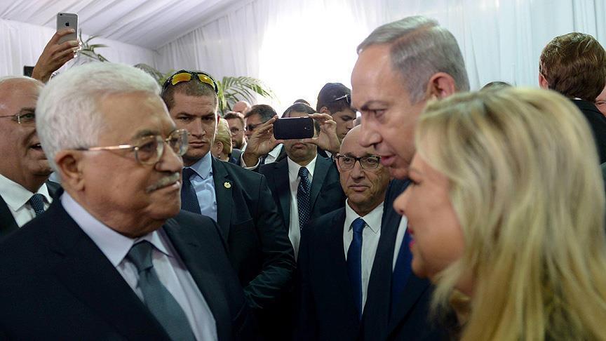 السجن عام والفصل من الخدمة لضابط فلسطيني دعا "عباس" إلى عدم المشاركة بجنازة "بيرس"