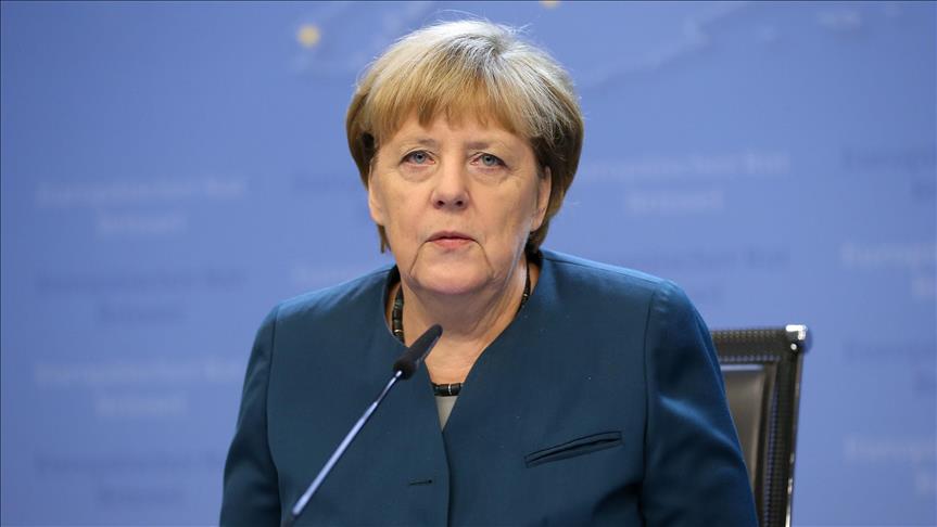 Merkel warns of extra sanctions over Russian airstrikes