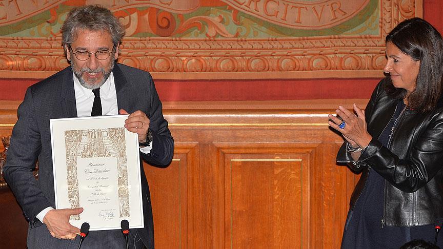 Fugitive Turkish editor granted citizenship of Paris