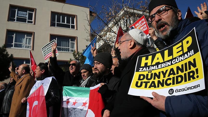 Hundreds at Russia, Iran embassies protest over Aleppo