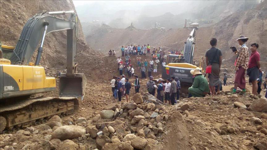 Myanmar suspends search for dozens missing in landslide