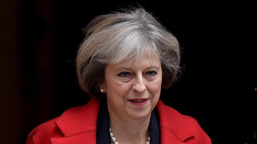 British premier promises to put Brexit plan before MPs